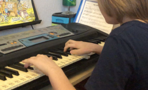 Rendys Busevics (aged 11) playing Bohemian Rhapsody by Queen on the piano